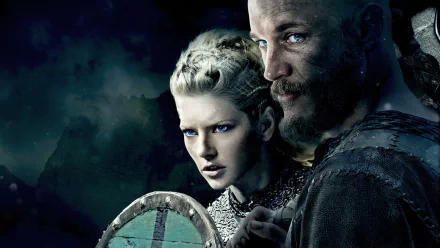 HD wallpaper featuring Lagertha (Katheryn Winnick) and Ragnar Lothbrok (Travis Fimmel) from the TV show Vikings (2013), showcasing an intense and dramatic scene.