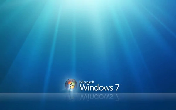 HD desktop wallpaper featuring the Microsoft Windows 7 logo with a radiant blue light background, embodying technology and modern PC aesthetics.