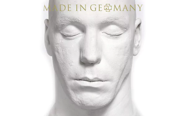 HD PC desktop wallpaper: stark white plaster-cast face with closed eyes beneath Made in Germany text — minimalist Rammstein/Germany music background.