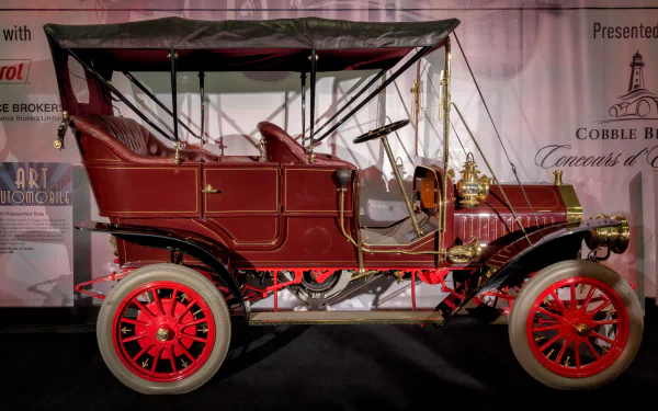 Vintage Buick Model F convertible car with red wheels, showcased as a classic vehicle in 4K Ultra HD desktop wallpaper and background.