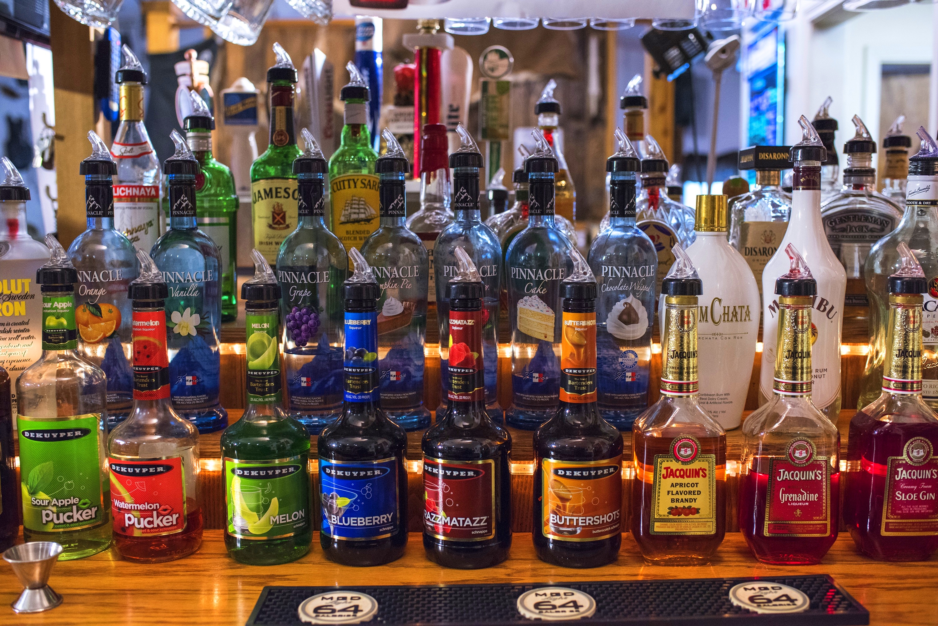 Alcoholic Drinks On A Bar by DizzyRoseblade