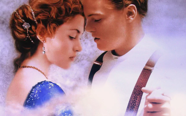 HD desktop wallpaper featuring Leonardo DiCaprio and Kate Winslet in a scene from the movie Titanic, showcasing an intimate moment between the characters in a dreamy background.