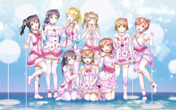 A vibrant HD wallpaper featuring the characters from Love Live!—Kotori Minami, Eri Ayase, Nico Yazawa, Nozomi Tojo, Umi Sonoda, Maki Nishikino, Honoka Kousaka, Hanayo Koizumi, and Rin Hoshizora.
