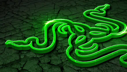 A high-definition desktop wallpaper featuring the Razer logo, illuminated in vibrant green against a textured black background, embodying cutting-edge technology and gaming culture.