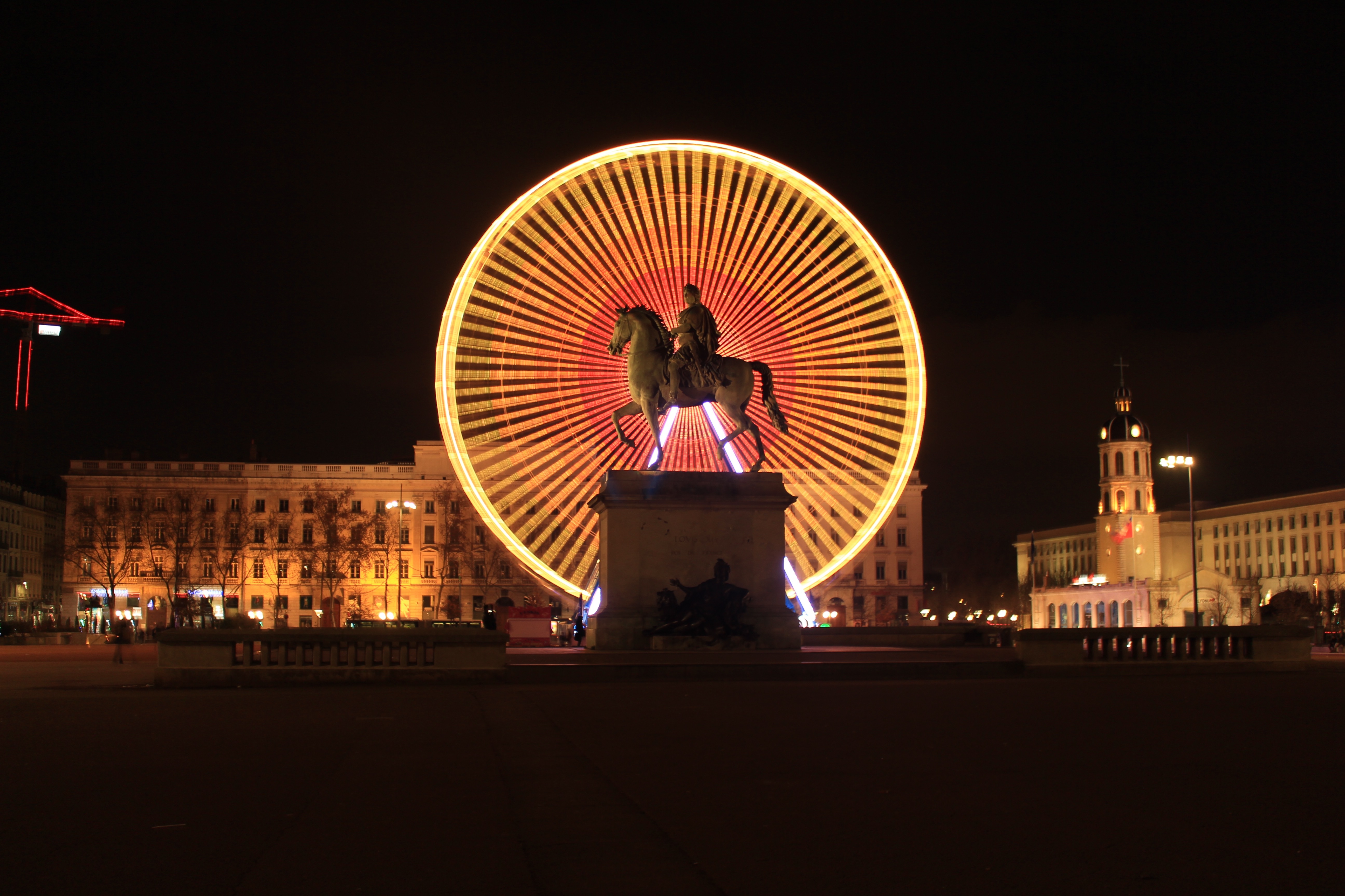Ferris Wheel and Statue of King Louis XIV in La Place Bellecour Lyon, France by Thomas43