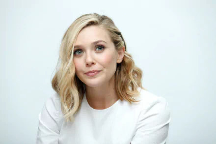 A close-up portrait of Elizabeth Olsen, featuring her soft blonde waves and thoughtful expression, set against a minimalist background, perfect for an HD desktop wallpaper.