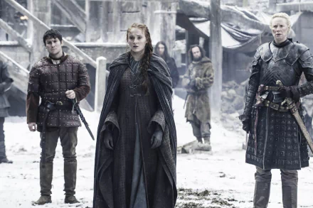 A scene from Game of Thrones featuring Podrick Payne, Sansa Stark, and Brienne of Tarth, set in a snowy landscape, showcasing the show's dramatic atmosphere and character dynamics.