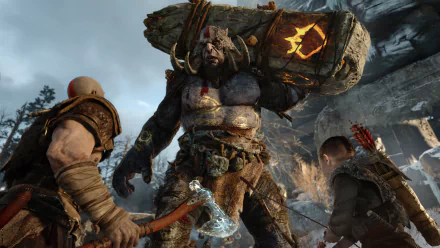 HD wallpaper depicting Kratos and his son fighting a giant monster in an epic scene from the 2018 video game God of War.