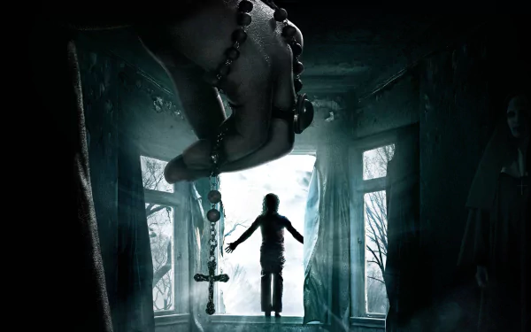 A haunting scene from *The Conjuring 2*, featuring a shadowy figure holding a rosary in a dimly lit doorway, evoking suspense and supernatural elements. HD desktop wallpaper.