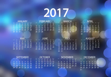 2017 calendar with months and dates displayed on a blue bokeh background, designed as a 4K Ultra HD PC desktop wallpaper.
