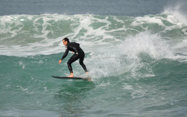  Surfer at Elouera beach on Bate Bay in Cronulla NSW Australia