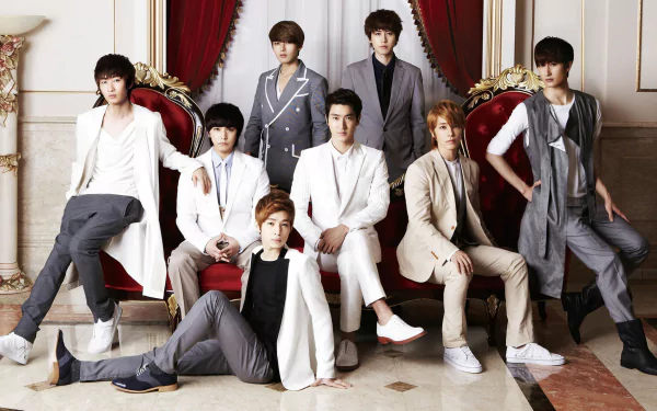 HD desktop wallpaper featuring the members of Super Junior dressed in stylish attire, posing elegantly in a luxurious room.