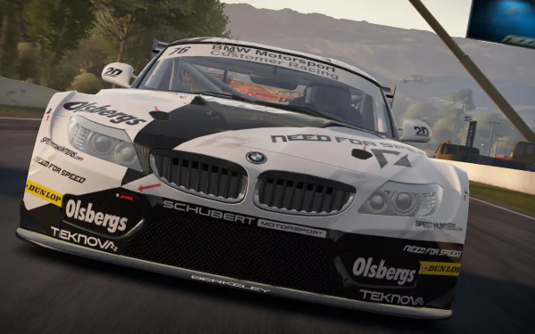 HD PC desktop wallpaper featuring a dynamic race scene from the video game Need for Speed: Shift 2 Unleashed with a detailed BMW race car on the track.
