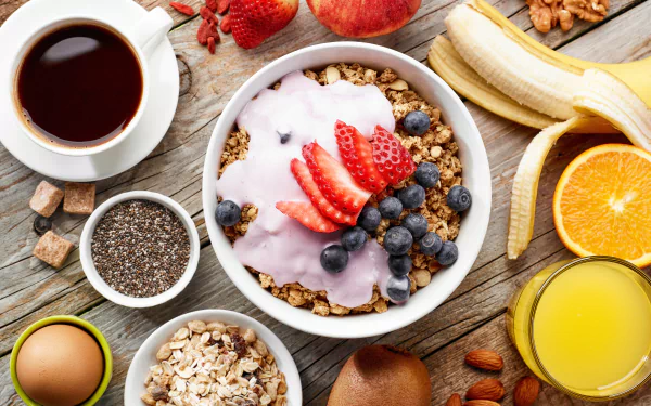 cereal banana egg cup strawberry blueberry muesli juice coffee food breakfast HD Desktop Wallpaper | Background Image