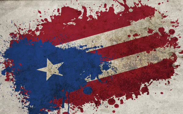Grunge-style Puerto Rico flag with splattered paint effect on a textured background, designed as an HD PC desktop wallpaper and background.