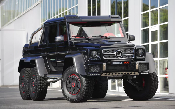 A black Brabus 6x6 vehicle parked outdoors, showcased in stunning 4K Ultra HD for a PC desktop wallpaper and background.