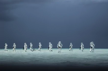 HD wallpaper from Rogue One: A Star Wars Story featuring stormtroopers on a beach under a dark, stormy sky.
