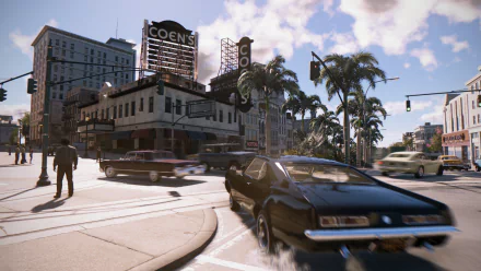 A vibrant HD wallpaper from Mafia III featuring a bustling street scene with classic cars and palm trees, set against a backdrop of city buildings and a vintage sign.