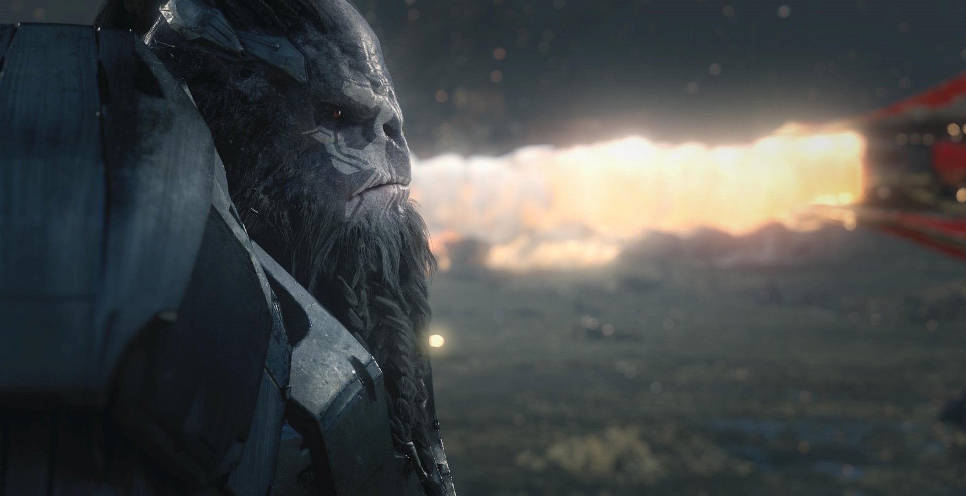 HD PC desktop wallpaper featuring a close-up of an alien character from the video game Halo Wars 2 against a blurred battlefield background.