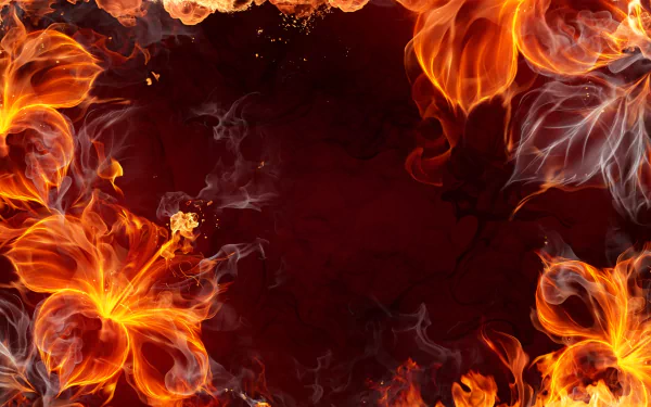 Artistic HD PC desktop wallpaper of fiery, flower-shaped flames framing a dark red center, vivid orange fire petals and wisps of smoke.