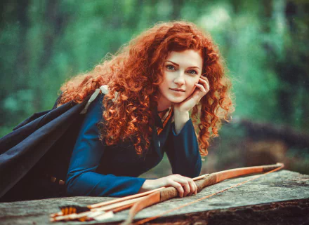 HD PC desktop wallpaper featuring a woman cosplaying Merida from the movie Brave, with vibrant red curly hair and a bow, set against a natural green background.