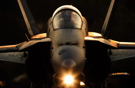 Close-up view of a McDonnell Douglas F/A-18 Hornet jet fighter, showcasing its military design and dynamic details, perfect for a high-definition desktop wallpaper.
