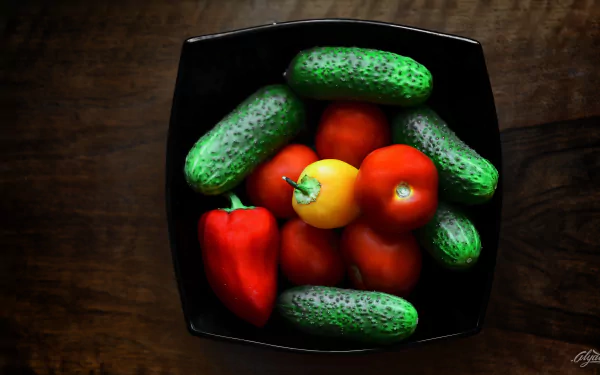 Still life 5K Ultra HD desktop wallpaper: Fruits & Vegetables — red tomatoes and a red pepper arranged with green pickles in a black bowl on dark wood.