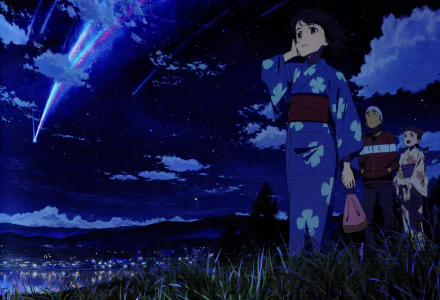 Mitsuha Miyamizu stands gazing at a starry sky, adorned in a blue kimono, as vibrant comets streak overhead. A stunning HD wallpaper from the anime *Your Name.*