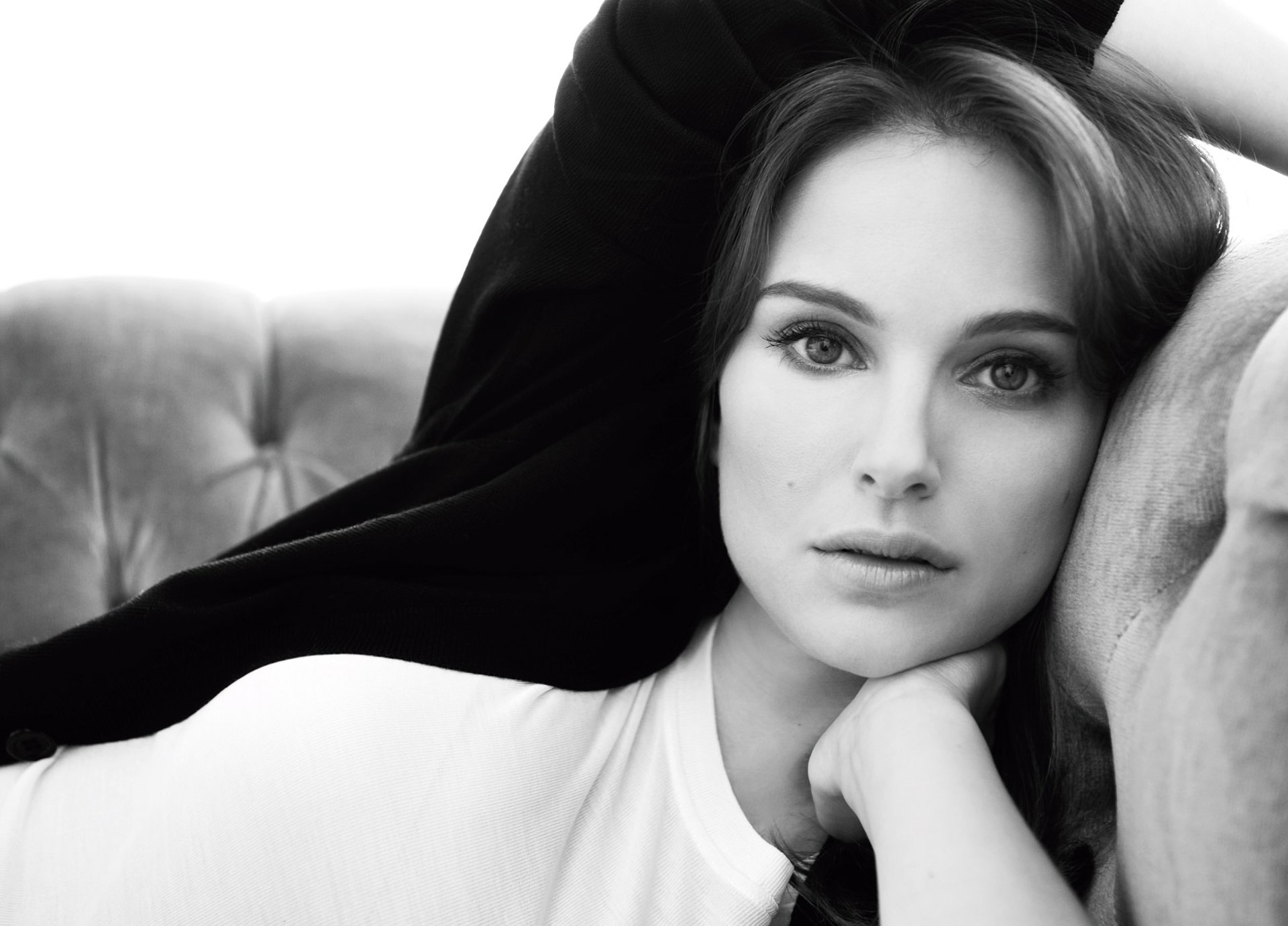 HD PC desktop wallpaper featuring a black-and-white portrait of celebrity Natalie Portman with a soft, contemplative expression.