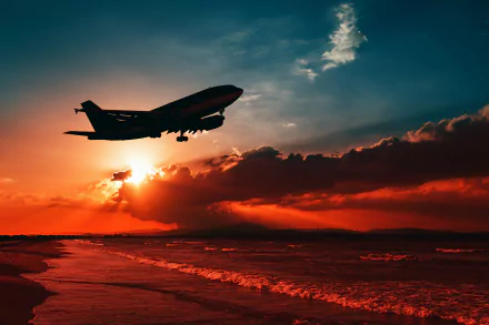 A silhouette of a passenger plane flies through a vibrant sunset sky, illuminated by sunbeams, with dramatic clouds in the background, creating a stunning HD wallpaper scene.