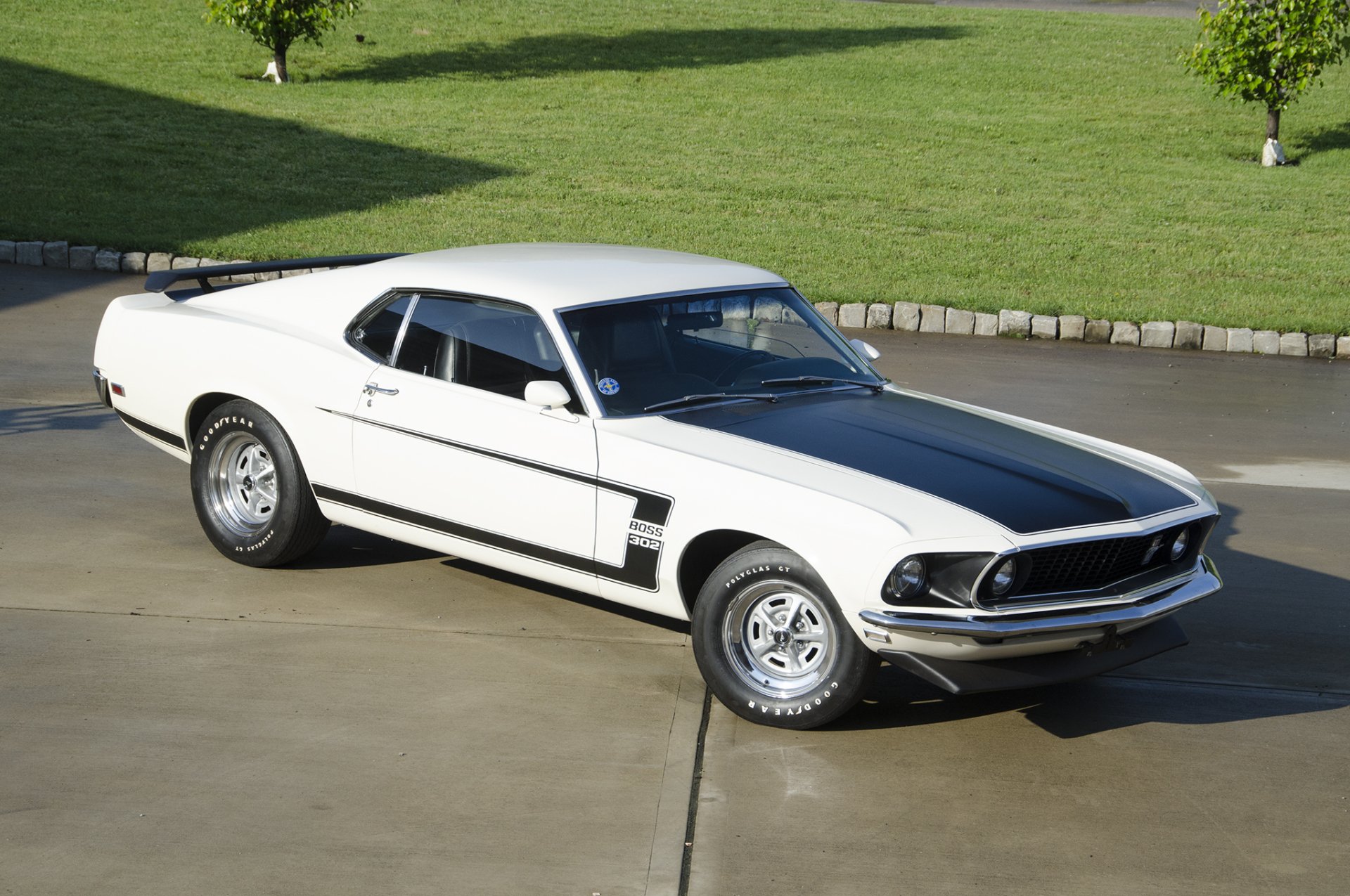 White 1969 Ford Mustang Boss 302 muscle car parked on a driveway, HD PC desktop wallpaper/background.