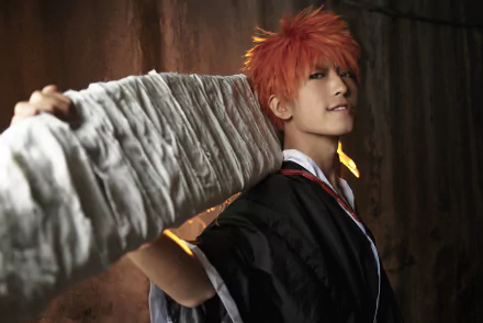 Cosplay of Ichigo Kurosaki from Bleach holding a large sword, set against a dark background, designed as an HD PC desktop wallpaper.