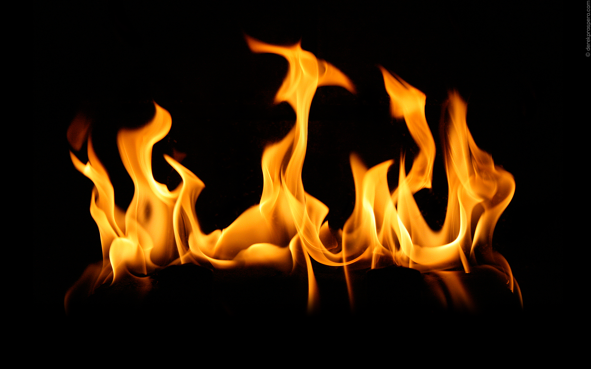Dancing Flames: A high-definition desktop wallpaper showcasing vibrant flames.