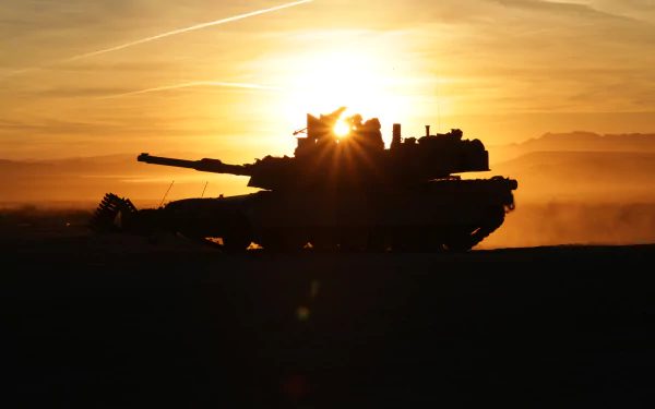 Silhouette of an M1 Abrams tank against a vibrant sunrise with a sunbeam shining through, captured in stunning 4K Ultra HD as a military-themed desktop wallpaper.