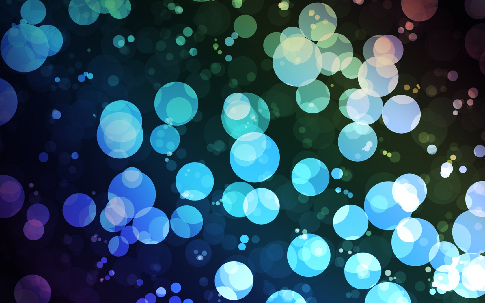 A vibrant, artistic HD wallpaper featuring a blend of colorful, soft circles against a dark background, creating a lively and dynamic visual effect.