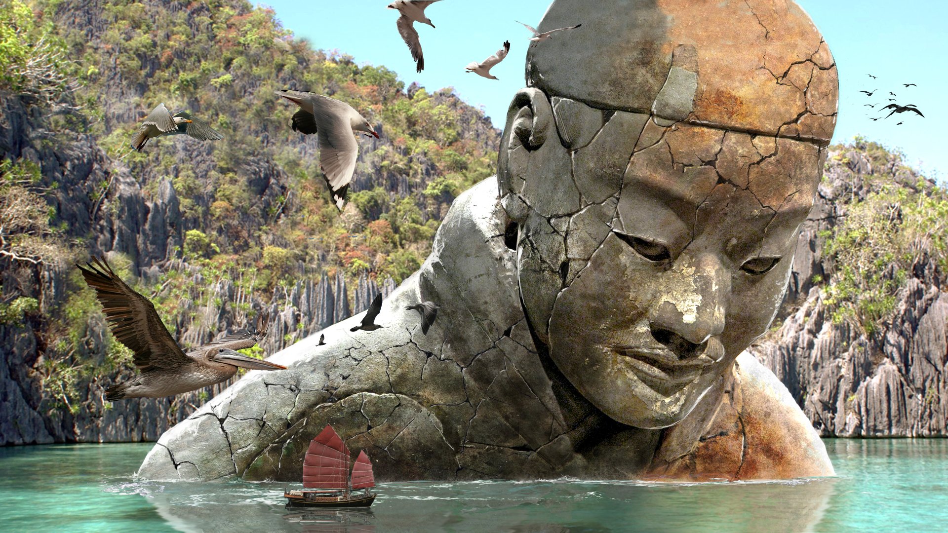 4K Ultra HD PC desktop wallpaper: artistic fantasy scene of a cracked giant stone head statue half-submerged off a lush coast, birds circling and a small sailboat.