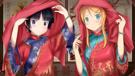 An HD desktop wallpaper featuring Ruri Gokō and Kirino Kousaka from the anime Oreimo, both wearing colorful traditional attire and playfully adjusting their red hoods. 