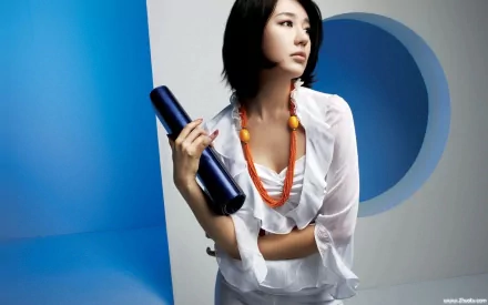 HD desktop wallpaper featuring a Korean woman, tagged as Yoon Eun Hye and Park Shin Hye, posing with a dark blue cylindrical object in front of a gradient blue and white background.