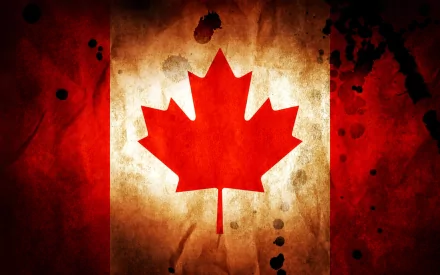 This image shows a high-definition Canadian flag desktop background, featuring a grunge-style design with a prominent red maple leaf on a textured, weathered surface.