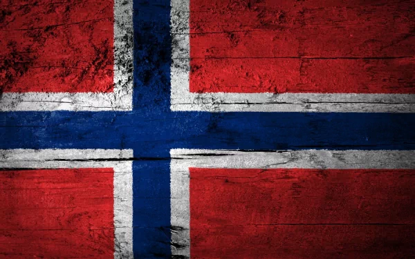 HD desktop wallpaper featuring the flag of Norway, showcasing its iconic red and blue design with a white cross on a textured background.