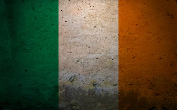 HD PC desktop wallpaper featuring the grunge-style Flag of Ireland with vertical green, white, and orange stripes on a textured background.