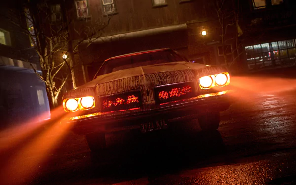 4K Ultra HD PC desktop wallpaper featuring a car with headlights on from the TV show Ash vs. Evil Dead in a dark, eerie street setting.