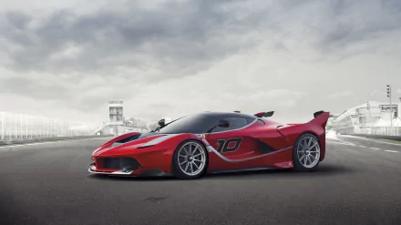 Red Ferrari FXX K race car on an empty racetrack under a cloudy sky, side view with racing livery 10 — 2K Quad HD PC desktop wallpaper/background