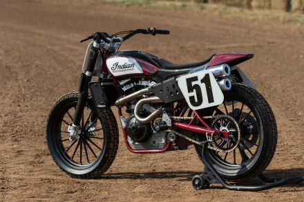 HD PC desktop wallpaper showing an Indian Scout FTR750 vehicle, number 51 flat-track race bike parked on a dirt track in a side profile view.