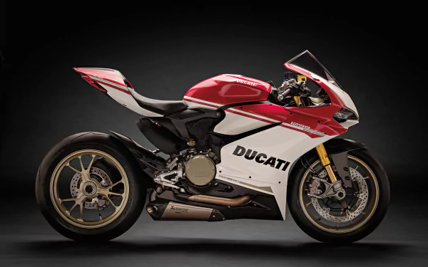 Side view of a red-and-white Ducati sport motorcycle vehicle on a dark backdrop — 4K Ultra HD PC desktop wallpaper background