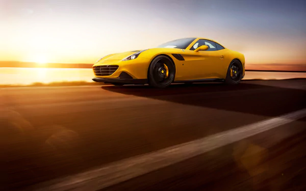 Yellow Novitec Rosso–tuned Ferrari California T at sunset — 4K Ultra HD PC desktop wallpaper/background showing a sleek performance vehicle.