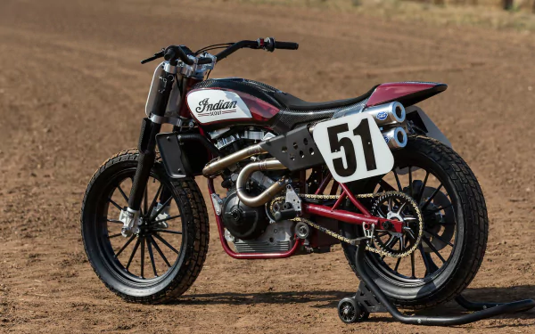 HD PC desktop wallpaper showing an Indian Scout FTR750 vehicle, number 51 flat-track race bike parked on a dirt track in a side profile view.
