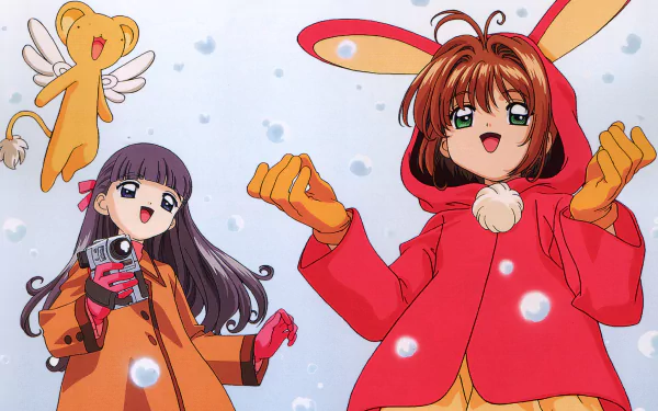 HD anime PC desktop wallpaper of Cardcaptor Sakura: Sakura Kinomoto in a red bunny-hood coat and Tomoyo Daidouji filming, with Keroberos floating amid falling snow.