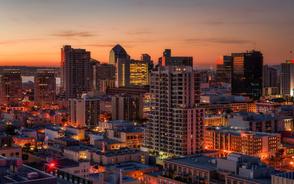 San Diego, USA evening skyline with illuminated skyscrapers and city buildings — 4K Ultra HD man-made urban landscape PC desktop wallpaper background