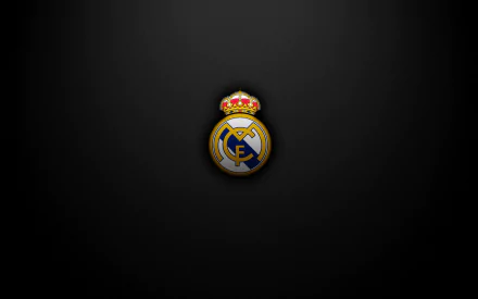 HD desktop wallpaper featuring the Real Madrid C.F. logo centered on a dark background.